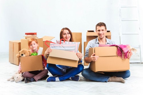 A student move with boxes and furniture in Battersea