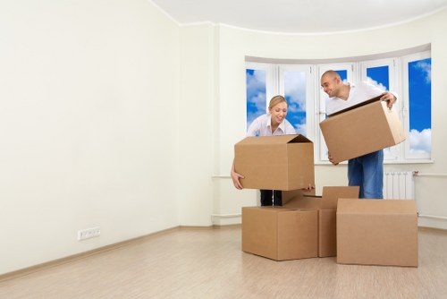 Packed boxes and furniture loaded into a removal van