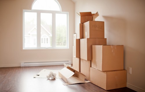 Packed living room ready for a flat removal in Battersea