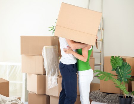 Local removal team carrying furniture near Battersea homes