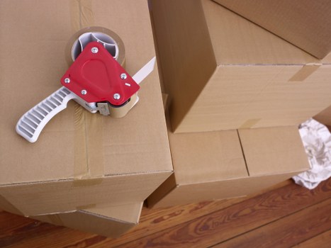 Moving team preparing fragile items during Battersea relocation