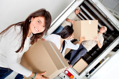 Staff assessing moving risks and property access before relocation