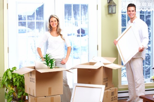 Removal vehicle and packed household items ready for transit